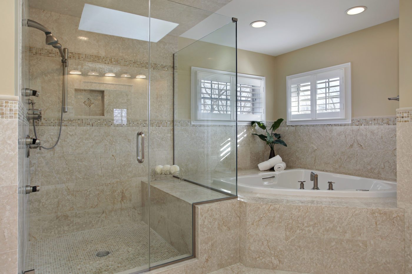 Modern master bath with large glass shower